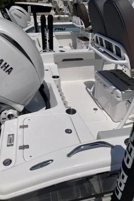 Slide: The Image of 2025 Sea Pro 202 Center Console boat with Yamaha engine, featuring spacious seating and storage. - 3