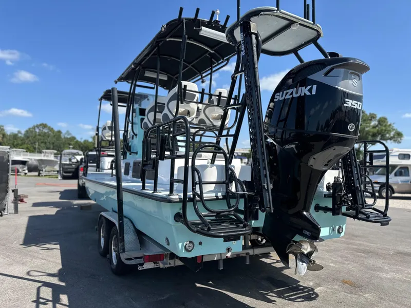 Slide: The Image of 2024 Shallow Master 270 SMC boat with Suzuki 350 engine on a trailer. - 10