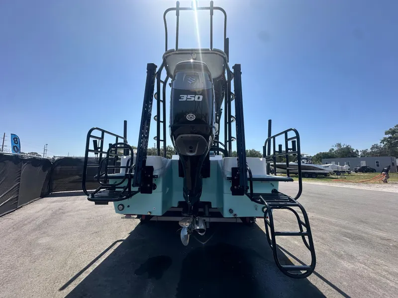 Slide: The Image of 2024 Shallow Master 270 SMC boat with powerful 350 engine, rear view. - 14