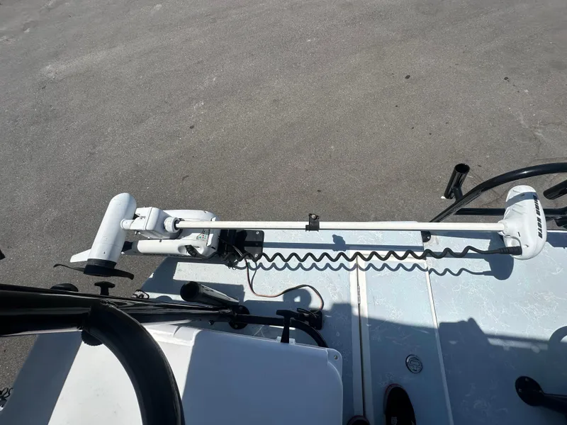 Slide: The Image of 2024 Shallow Master 270 SMC boat deck with mounted trolling motor. - 36