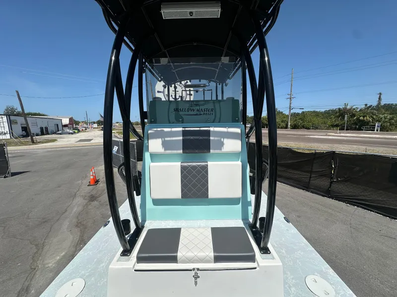Slide: The Image of 2024 Shallow Master 270 SMC boat with stylish seating and sleek design. - 37