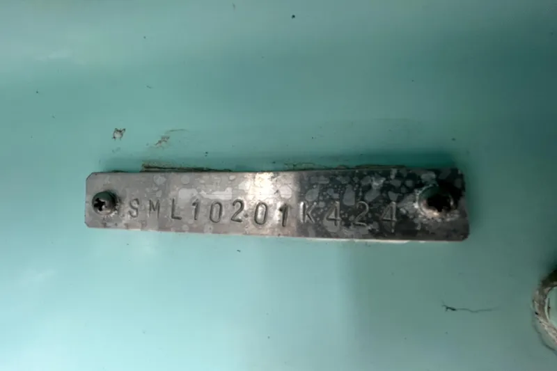 Slide: The Image of Metal plate with serial number SML10201K424 on Shallow Master 270 SMC, 2024 model. - 54