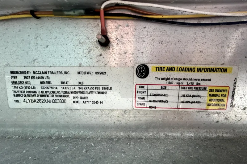 Slide: The Image of Trailer tire and loading information label, McClain Trailers, 2024 Shallow Master 270 SMC. - 56