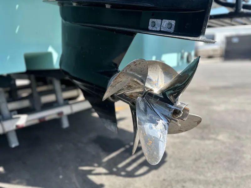 Slide: The Image of 2024 Shallow Master 270 SMC boat propeller, close-up view, outdoors. - 9