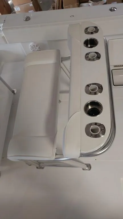 Slide: The Image of 2019 Onslow Bay 33 Tournament boat seating with integrated cup holders. - 21