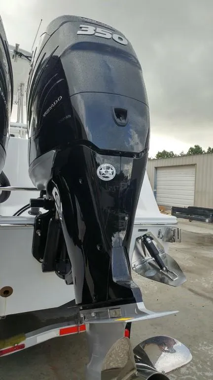 Slide: The Image of 2019 Onslow Bay 33 Tournament boat with powerful 350 horsepower outboard engine. - 40