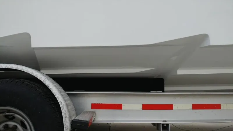 Slide: The Image of 2019 Onslow Bay 33 Tournament boat on trailer, side view. - 46