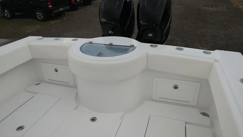 Slide: The Image of 2019 Onslow Bay 33 Tournament boat with dual engines and spacious deck layout. - 49
