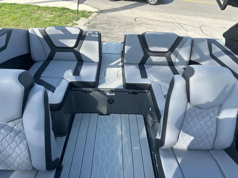 Slide: The Image of 2025 Yamaha Boats 222XD interior with modern gray seating and sleek design. - 8
