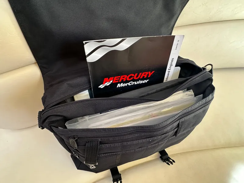 Slide: The Image of Backpack with Mercury MerCruiser manual, related to 2004 Sea Ray 340 Sundancer. - 40