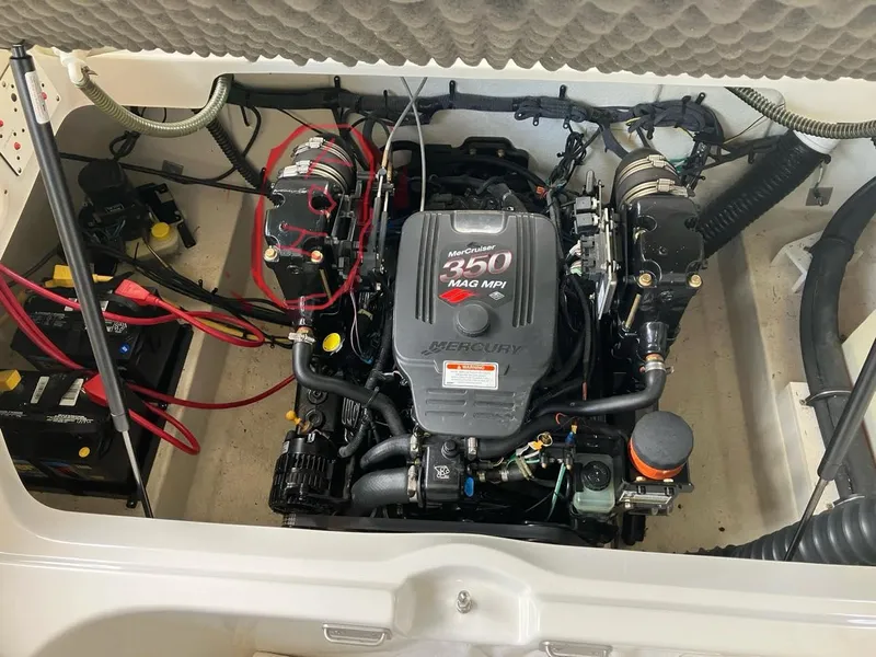 Slide: The Image of Engine compartment of a 2006 Crownline 270 BR boat with MerCruiser 350 MAG MPI engine. - 11