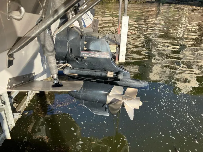 Slide: The Image of 2006 Crownline 270 BR boat with MerCruiser outdrive in water. - 6