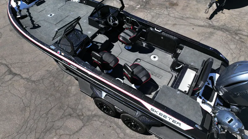 Slide: The Image of 2025 Skeeter WXR2260 boat with sleek design, spacious seating, and modern features. - 5