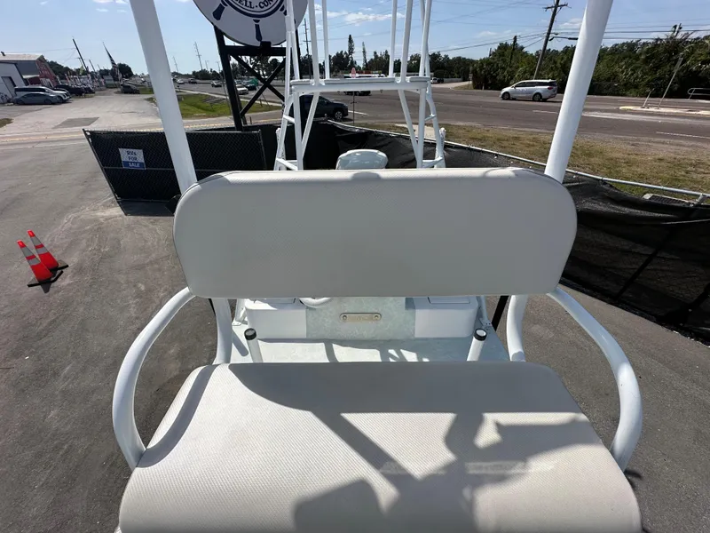 Slide: The Image of 2023 Shallow Master 240 SMS boat seat with street view background. - 33