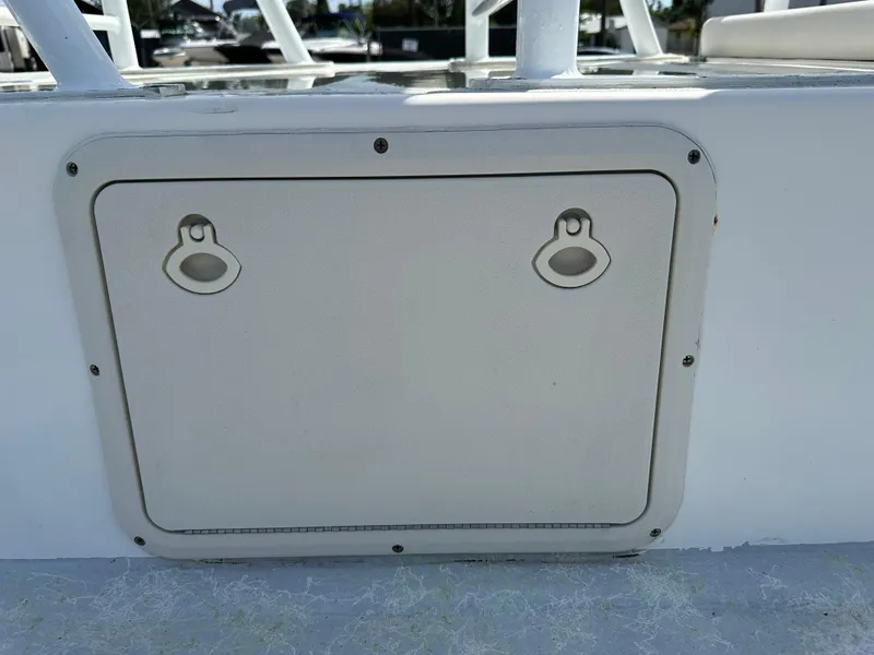 Slide: The Image of Access panel on a 2023 Shallow Master 240 SMS boat. - 41