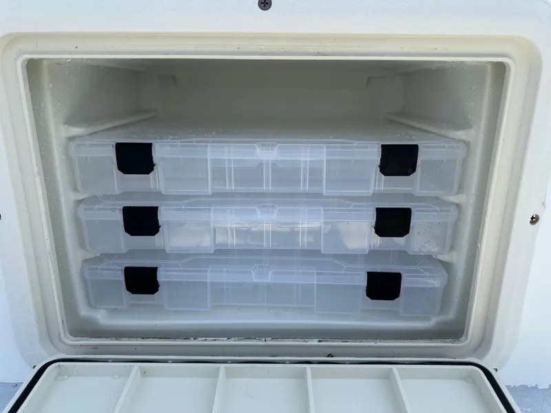 Slide: The Image of Storage compartment with three clear plastic boxes, Shallow Master 240 SMS, 2023 model. - 43