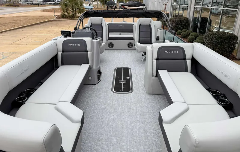 Slide: The Image of 2025 Harris CRUISER 230 SLDH pontoon boat interior with luxurious seating and modern design. - 15