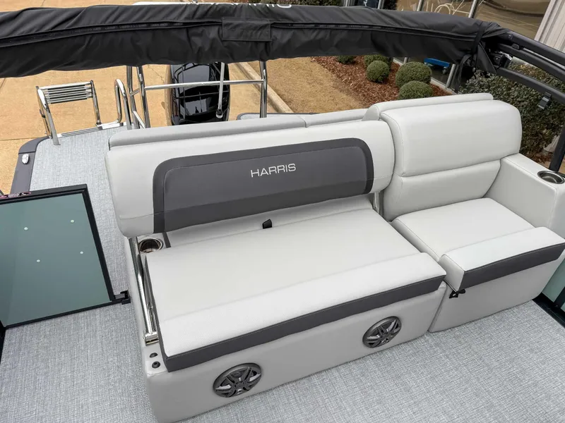 Slide: The Image of 2025 Harris CRUISER 230 SLDH boat interior with sleek seating and modern design. - 20