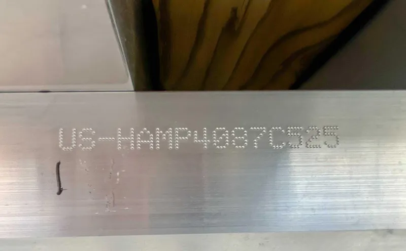 Slide: The Image of 2025 Harris CRUISER 230 SLDH hull identification number engraved on metal surface. - 18