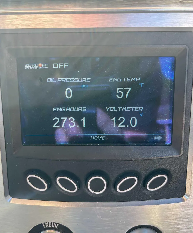 Slide: The Image of Dashboard of a 2015 MasterCraft NXT20 showing engine metrics and controls. - 15