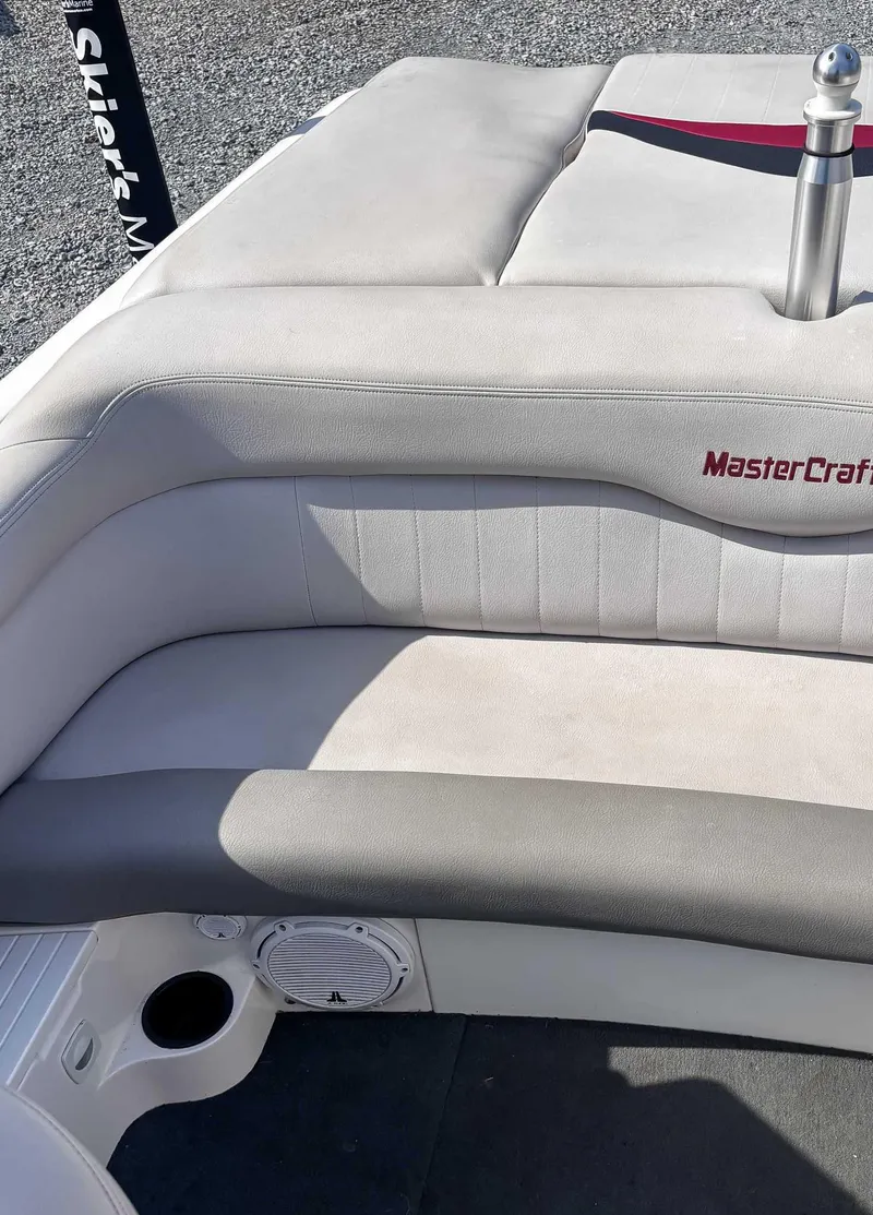 Slide: The Image of 2008 MasterCraft X1 boat interior with cushioned seating and speaker detail. - 17