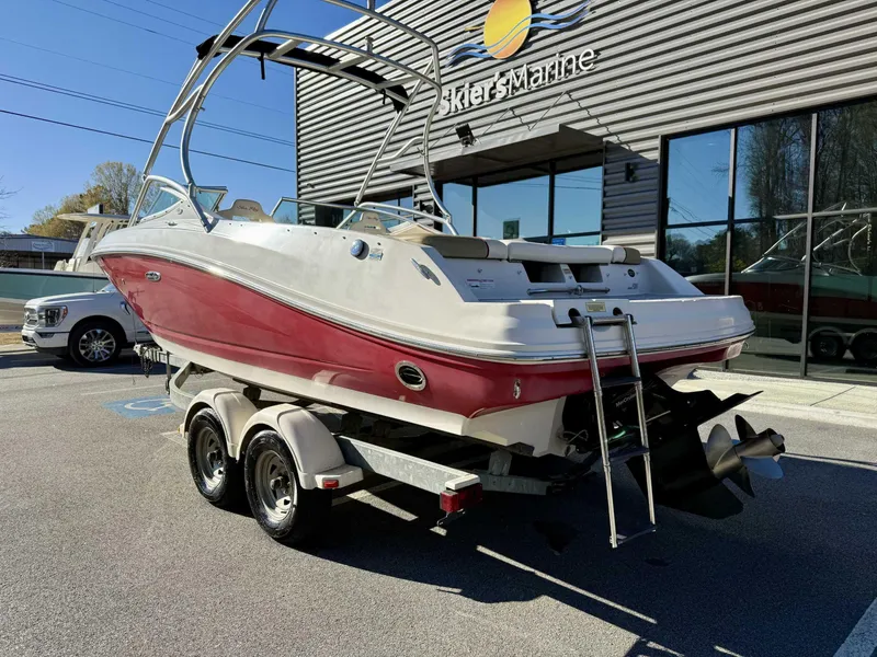 Slide: The Image of 2007 Sea Ray 230 Select boat on trailer outside Skier's Marine dealership. - 7