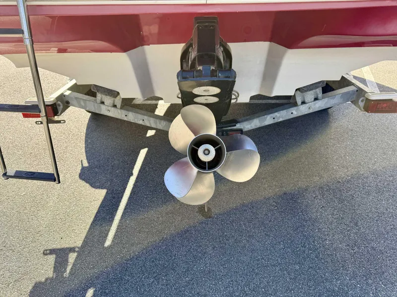 Slide: The Image of Rear view of 2007 Sea Ray 230 Select boat with propeller and trailer. - 9