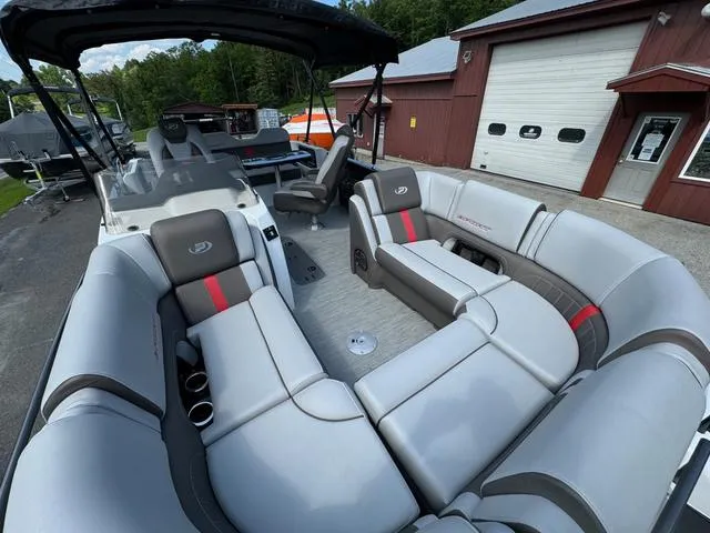 Slide: The Image of 2024 Princecraft Vogue® 23 RL pontoon boat with luxurious seating and modern design. - 12