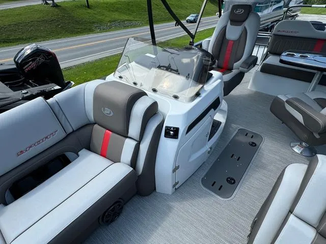Slide: The Image of 2024 Princecraft Vogue® 23 RL boat interior with modern seating and console design. - 13