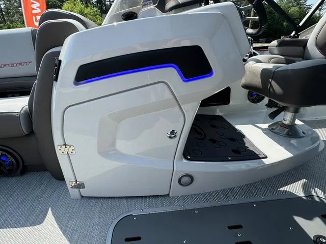 Slide: The Image of 2024 Princecraft Vogue® 23 RL boat console with sleek design and blue LED lighting. - 35