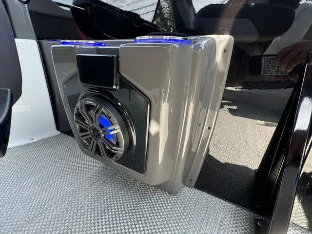 Slide: The Image of 2024 Princecraft Vogue® 23 RL boat speaker with blue LED lighting on textured flooring. - 36