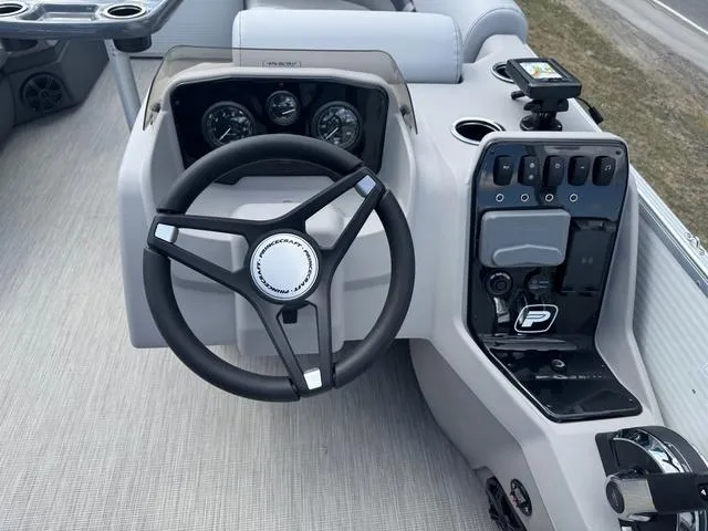 Slide: The Image of Steering console of 2025 Princecraft Vectra 19 L 60HP boat with modern controls and gauges. - 13