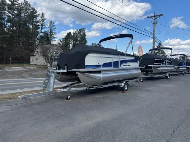 Slide: The Image of 2025 Princecraft Vectra 19 L 60HP pontoon boat on trailer, covered, parked roadside. - 3