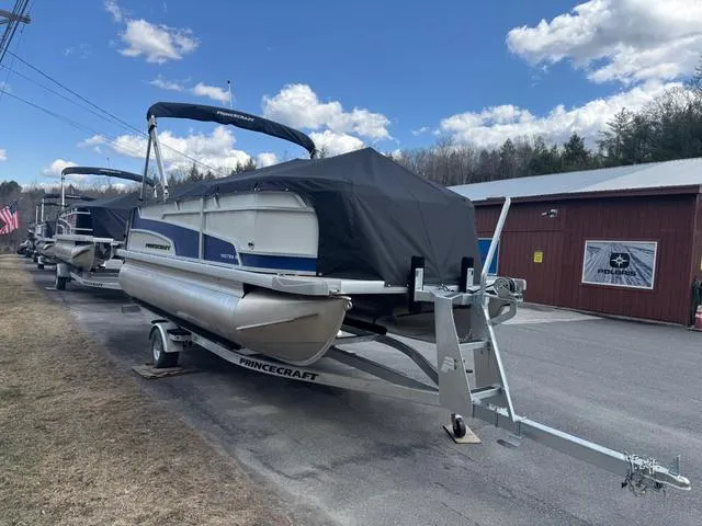 Slide: The Image of 2025 Princecraft Vectra 19 L 60HP pontoon boat on trailer, covered, outdoors. - 4