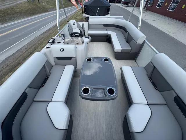 Slide: The Image of 2025 Princecraft Vectra 19 L 60HP pontoon boat interior with spacious seating and table. - 7