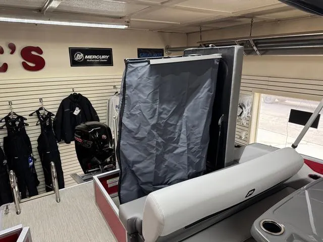 Slide: The Image of 2025 Princecraft Vectra 21 RL 115HP boat interior with Mercury engine display. - 10