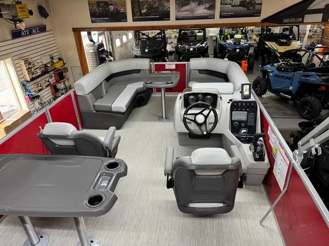 Slide: The Image of 2025 Princecraft Vectra 21 RL 115HP pontoon boat interior with seating and steering console. - 8