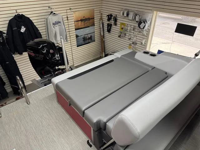 Slide: The Image of 2025 Princecraft Vectra 21 RL 115HP boat interior with gray seating and accessories display. - 9