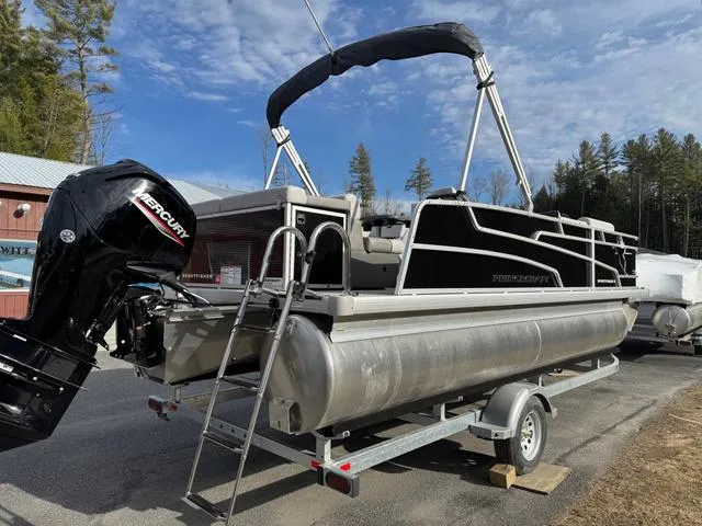 Slide: The Image of 2025 Princecraft SportFisher 21-2S 90HP pontoon boat on trailer, outdoors. - 3