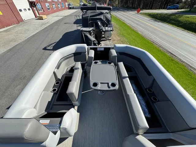 Slide: The Image of 2025 Princecraft Vectra 21 L 90HP pontoon boat with spacious seating and table. - 5