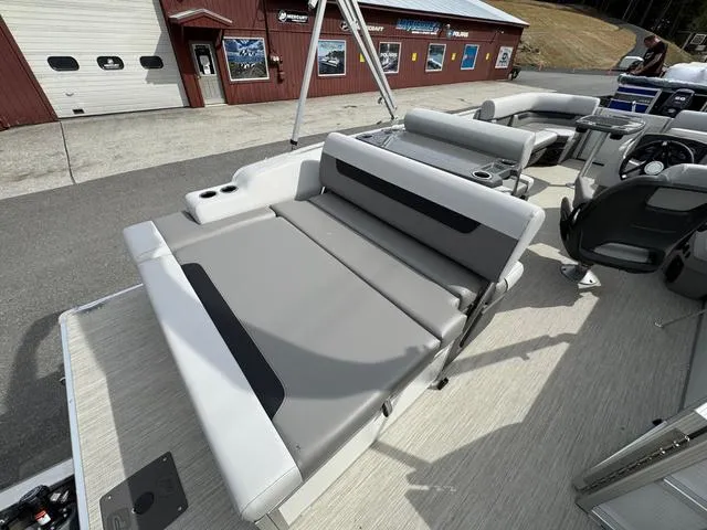 Slide: The Image of 2025 Princecraft Vectra 21 RL 150HP pontoon boat interior with gray seating and cup holders. - 9