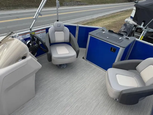 Slide: The Image of 2025 Princecraft Jazz 19-4S 60HP boat interior with seating and steering console. - 10