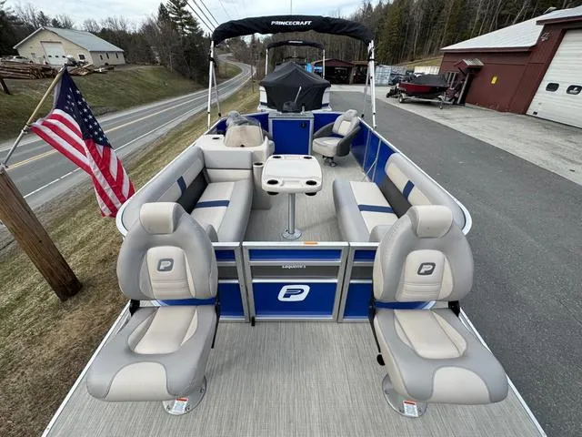 Slide: The Image of 2025 Princecraft Jazz 19-4S 60HP pontoon boat with seating and American flag. - 7