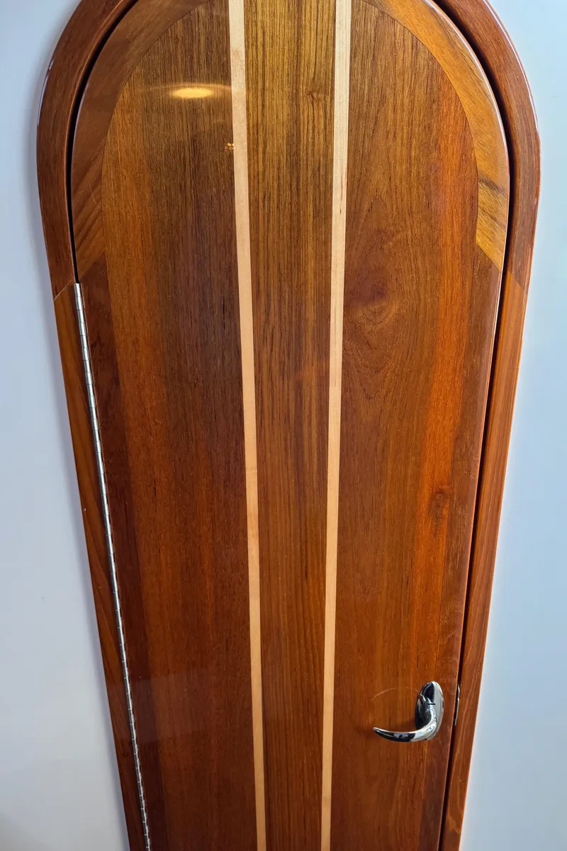 Slide: The Image of Wooden door with sleek design on a 2010 Ocean Sport Roamer boat. - 28