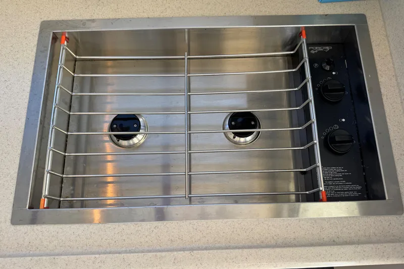 Slide: The Image of Stainless steel boat stove with dual burners, Ocean Sport Roamer 2010 model. - 33