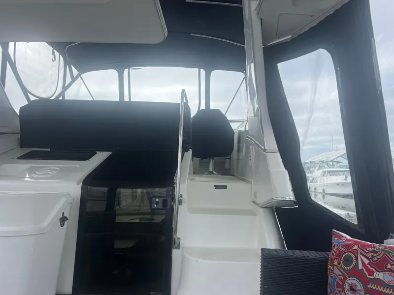 Slide: The Image of 1999 Bayliner 4087 Aft Cabin Motoryacht interior with stairs and seating area. - 10