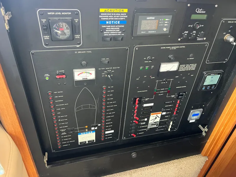 Slide: The Image of Control panel of a 1999 Bayliner 4087 Aft Cabin Motoryacht. - 24