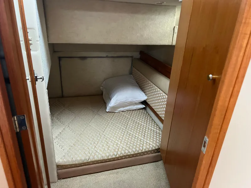 Slide: The Image of 1999 Bayliner 4087 Aft Cabin Motoryacht interior cabin with bed and pillow. - 27
