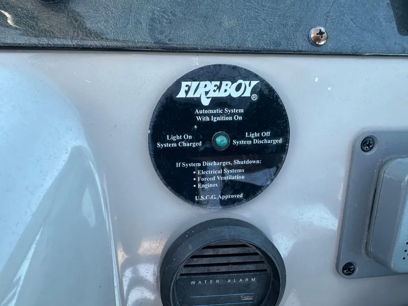 Slide: The Image of Fireboy automatic system indicator on 2004 Cruisers Express boat dashboard. - 19