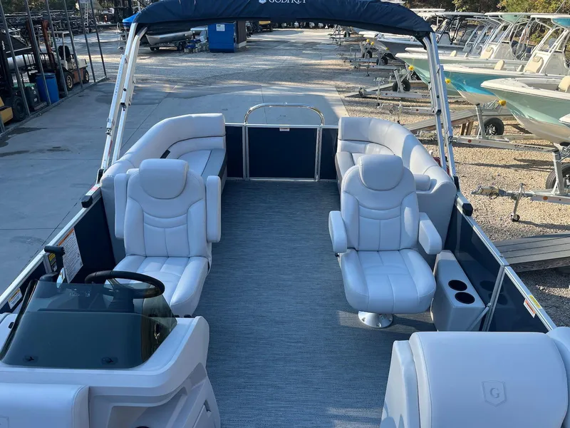 Slide: The Image of 2024 Godfrey SWEETWATER 2286 SB pontoon boat with plush seating and modern design. - 3